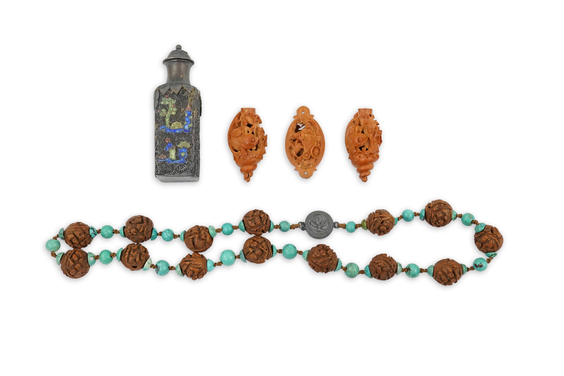 A Chinese silver filigree work and enamel scent bottle, by Wongshing, three carved peach stones, and a kernel and turquoise bead necklace, late 19/early 20th century